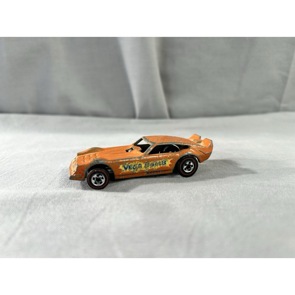 Vintage 1969 Hot Wheels Vega Bomb orange die-cast funny car Red Line Era